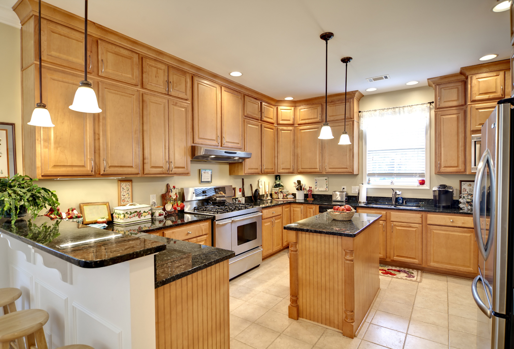 light wood kitchen cabinets with black countertops testimonials a c a remodeling design light wood kitchen cabinets with black countertops testimonials a c a remodeling design